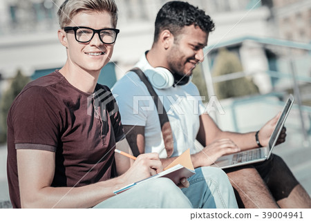 Nice smart student taking notes Nice smart student taking notes 39004941