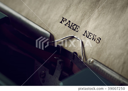 text fake news written with a typewriter 39007250