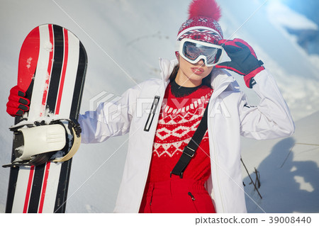 winter, leisure, sport and people concept - happy young woman in winter, leisure, sport and people concept - happy young woman in 39008440