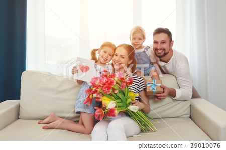 happy mother's day! father and children congratulate mother on h happy mother's day! father and children congratulate mother on h 39010076