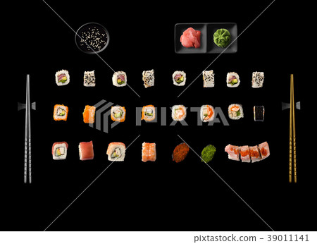 Set of Japanese sushi isolated on black background Set of Japanese sushi isolated on black background 39011141