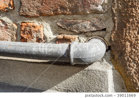 The water pipes on the wall 39011669