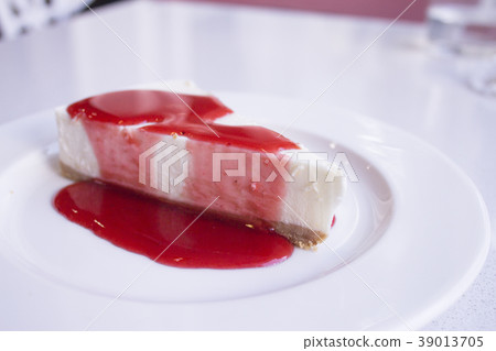Cheesecake with strawberry syrup Cheesecake with strawberry syrup 39013705