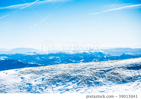 Umbria valley in a snowy winter morning from the mountains Umbria valley in a snowy winter morning from the mountains 39013841