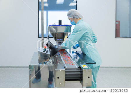 Pharmacy industry woman worker in protective Pharmacy industry woman worker in protective 39015985