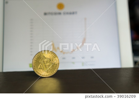 bitcoin and background of graph on table bitcoin and background of graph on table 39016209