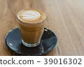 Hot coffee cup on wooden table 39016302