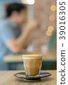 Hot coffee cup on wooden table 39016305