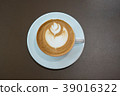 Hot coffee cup on wooden table 39016322