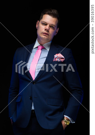 Portrait of confident handsome businessman looking Portrait of confident handsome businessman looking 39016395