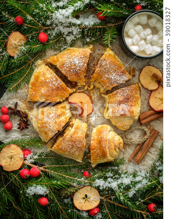 Christmas homemade pastry. Apple strudel (pie) Christmas homemade pastry. Apple strudel (pie) 39018327