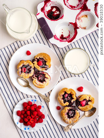 Tasty fresh homemade puff pastry with berries Tasty fresh homemade puff pastry with berries 39018330