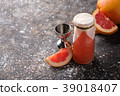Fresh fruit cocktail on a dark background. 39018407