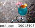 Fresh fruit cocktail on a dark background. 39018408