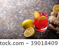 Fresh fruit cocktail on a dark background. 39018409