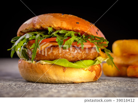 Fresh juicy delicious homemade burger. Fresh juicy delicious homemade burger. 39018412