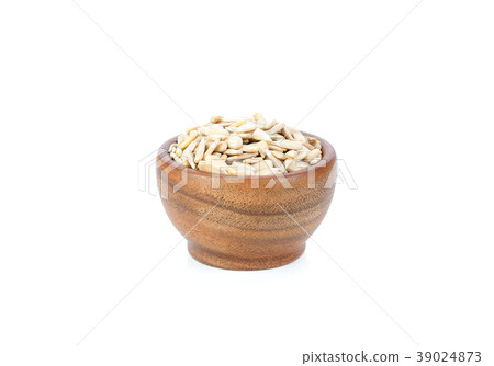 Sun flower seed on wood bowl on white background Sun flower seed on wood bowl on white background 39024873