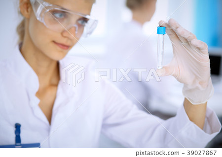 Female scientific researcher in laboratory Female scientific researcher in laboratory 39027867
