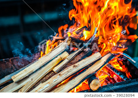 Wood burning in the grill Wood burning in the grill 39028094