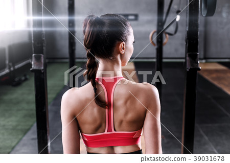 Girl in a sport gym Girl in a sport gym 39031678