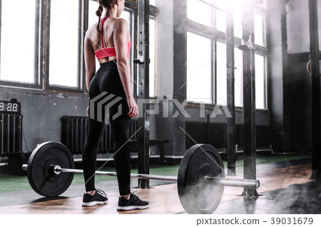 Girl with a bar-bell Girl with a bar-bell 39031679