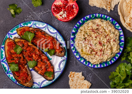 Classic baba ganush and baked eggplant with sauce. 39032020