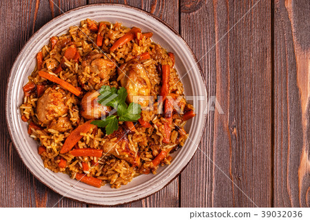 Pilaf (biryani) on a wooden background 39032036