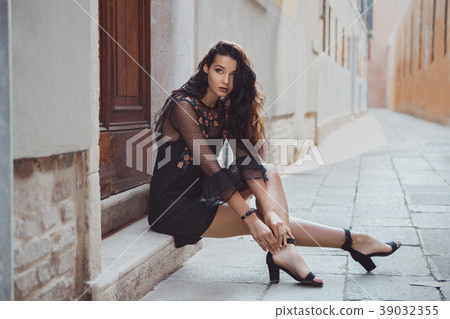 Travel tourist woman on city street against Travel tourist woman on city street against 39032355