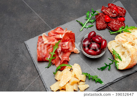 Traditional italian meals - prosciutto crudo or Traditional italian meals - prosciutto crudo or 39032647