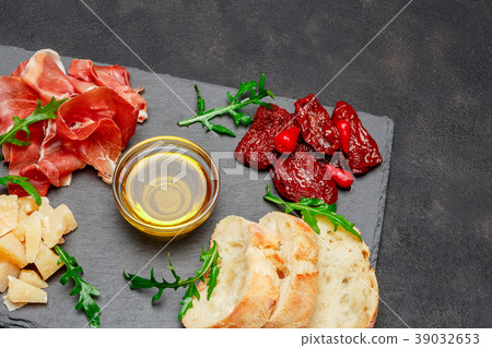 Traditional italian meals - prosciutto crudo or Traditional italian meals - prosciutto crudo or 39032653