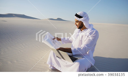 Muslim Arabian UAE Sheikh architect sitting with 39038135