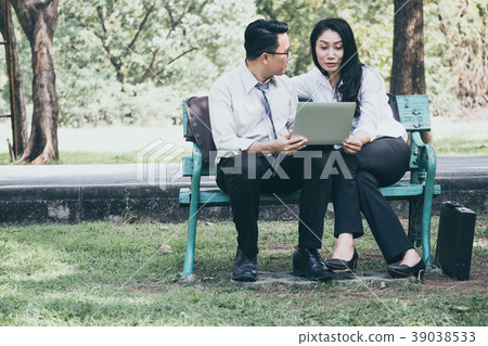 business people are working in a park 39038533