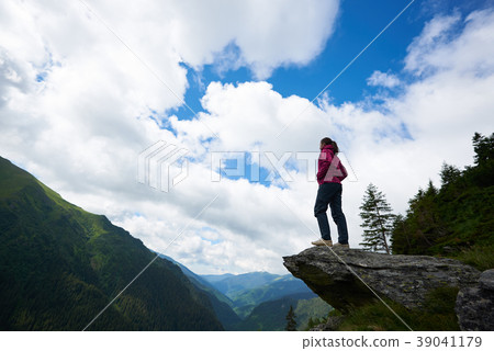 Upward shot of young female tourist Upward shot of young female tourist 39041179