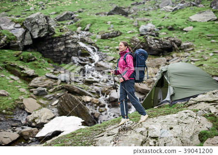 Female hiker in the mountains of Romania Female hiker in the mountains of Romania 39041200