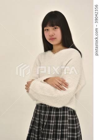 Girl with arms folded Girl with arms folded 39042356