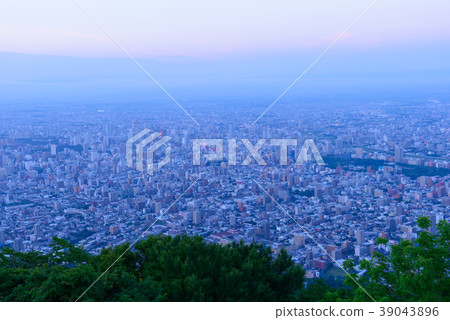 A view of Sapporo cityscape at the dusk of Hokkaido 39043896
