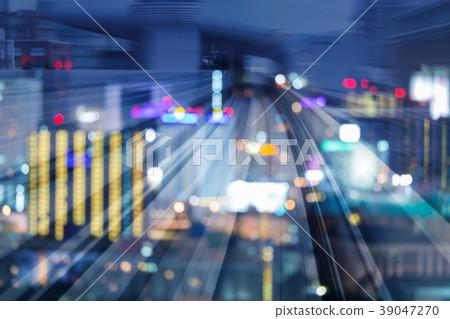 Night motion blurred moving train over night Night motion blurred moving train over night 39047270