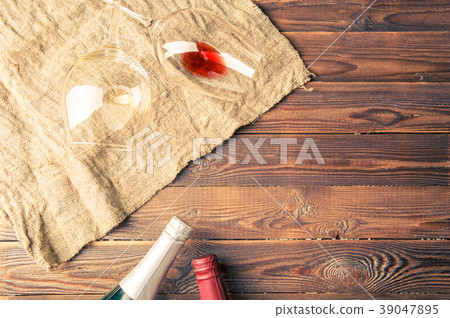 Picture of two wine bottles and wine glasses on Picture of two wine bottles and wine glasses on 39047895