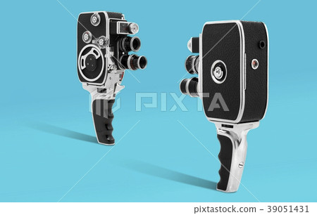 Old Vintage cinema camera 8mm colorful background Old Vintage cinema camera 8mm colorful background 39051431