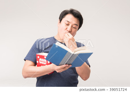 Morning, middle age, reading, popcorn Morning, middle age, reading, popcorn 39051724