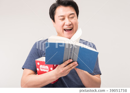 Morning, middle age, reading, popcorn Morning, middle age, reading, popcorn 39051738