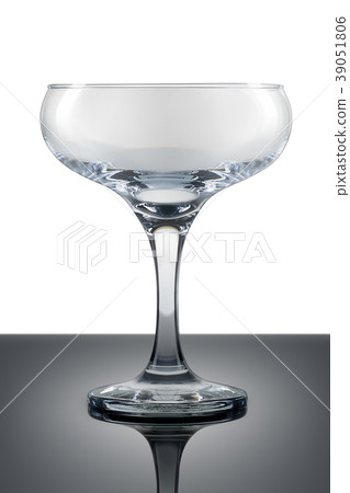 Empty champagne glass isolated on a white Empty champagne glass isolated on a white 39051806