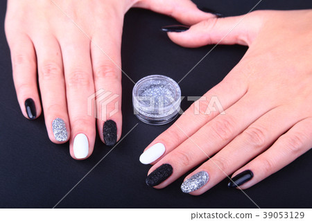 Black, white Nail art manicure. Holiday style 39053129