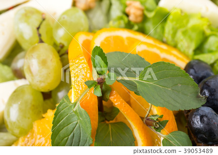 Georgian cheese platter with grapes and walnuts Georgian cheese platter with grapes and walnuts 39053489