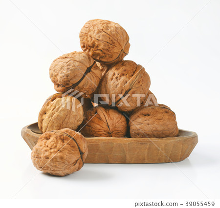 bowl of whole walnuts bowl of whole walnuts 39055459