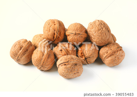 pile of whole walnuts pile of whole walnuts 39055483