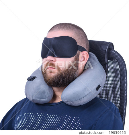Bearded man with sleeping mask and grey travel 39059633