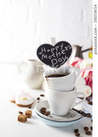 cup on a cup with espresso coffee on a white 39059654