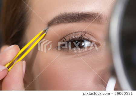 Pleasant girl is taking care of herself 39060551