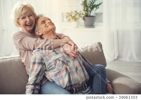 Happy old couple behaving like youth 39061303